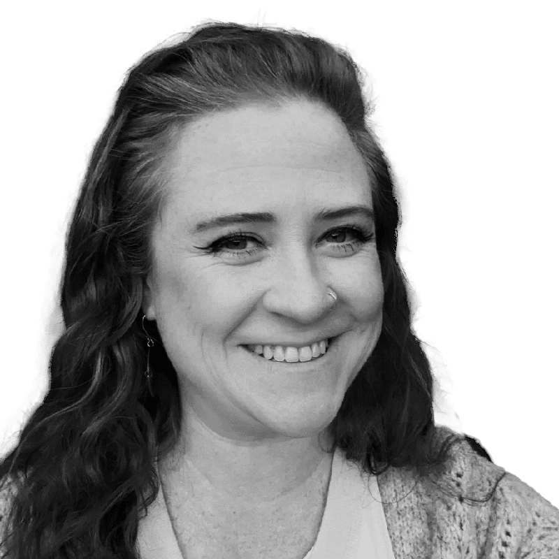 Elizabeth Brannon portrait, a smiling face and long red hair